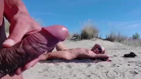 guy jerks off to girl at a public nude beach 